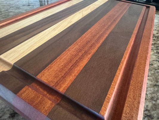 Handcrafted Maple, Walnut, and Mahogany Edge Grain Cutting Board