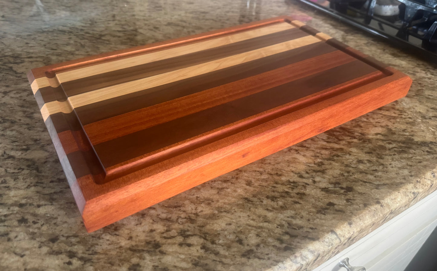 Handcrafted Maple, Walnut, and Mahogany Edge Grain Cutting Board