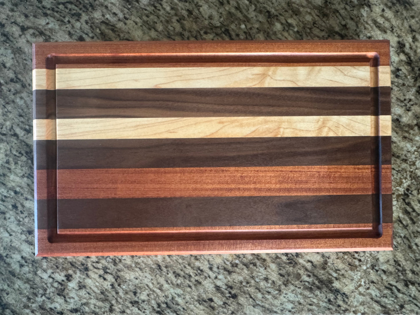 Handcrafted Maple, Walnut, and Mahogany Edge Grain Cutting Board
