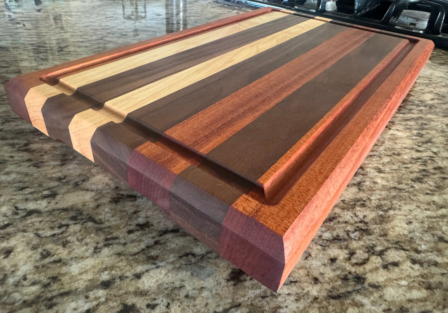 Handcrafted Maple, Walnut, and Mahogany Edge Grain Cutting Board