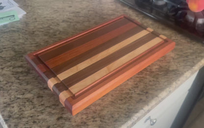 Handcrafted Maple, Walnut, and Mahogany Edge Grain Cutting Board